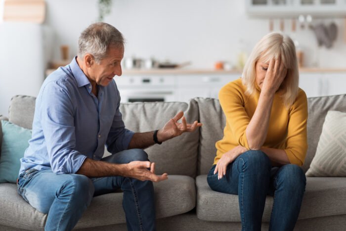 Couple discussing alimony fairness with a divorce lawyer in New Jersey