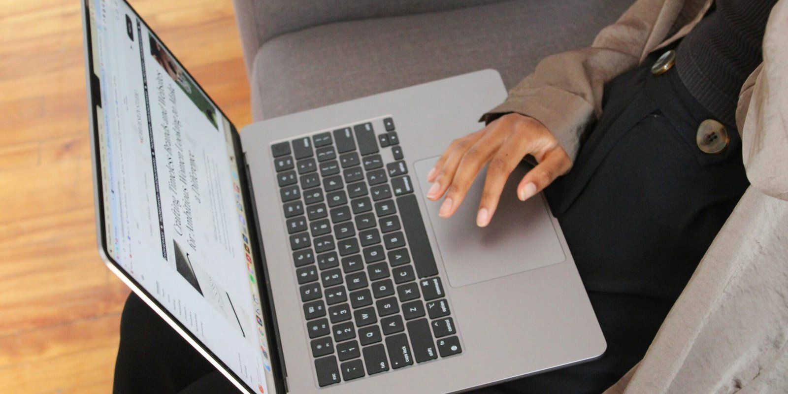 person typing on laptop.